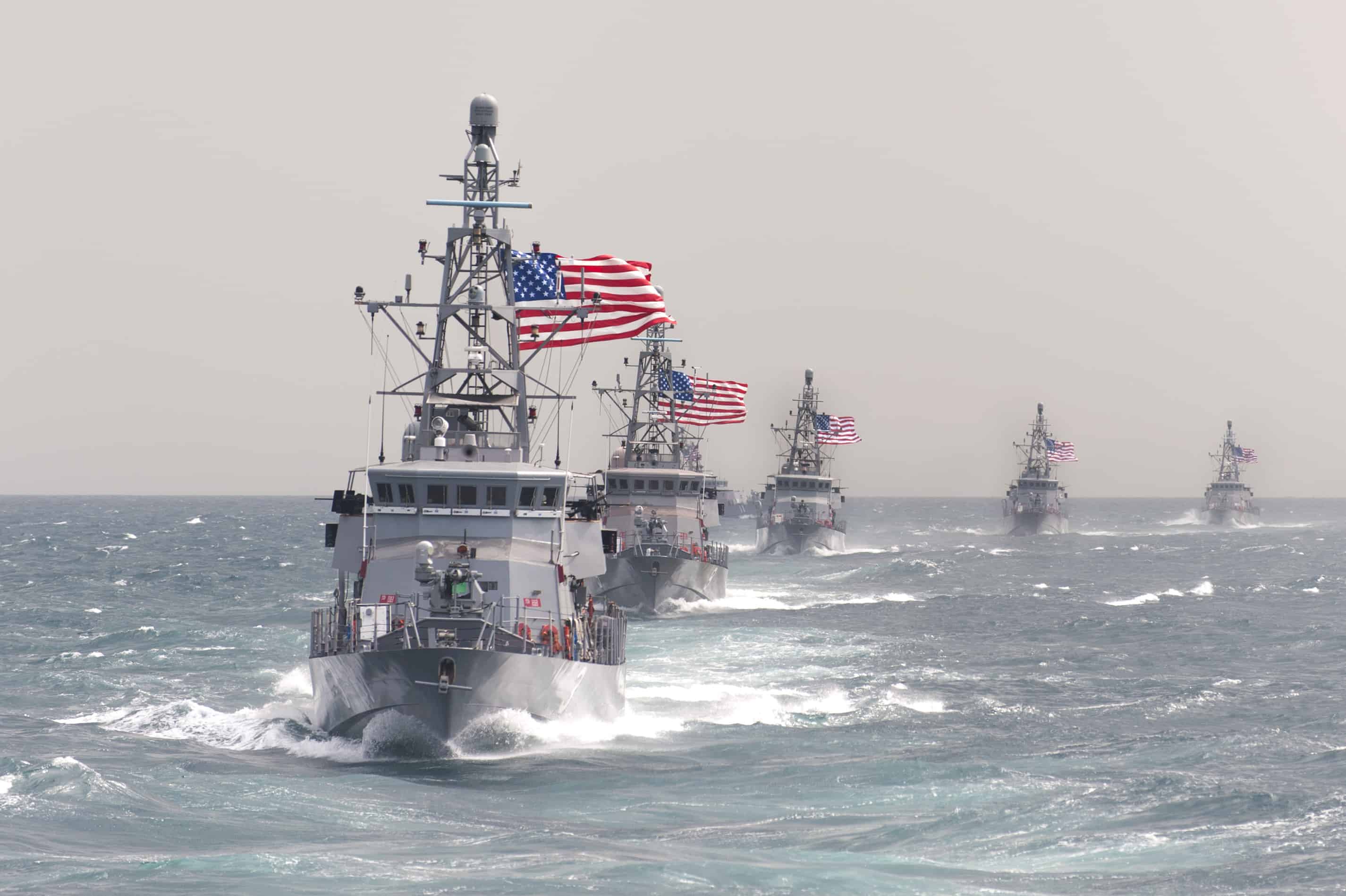 U.S. 5TH FLEET AREA OF RESPONSIBILITY (March 17, 2014) The Cyclone-class coastal patrol ship USS Hurricane (PC 3) leads other coastal patrol ships assigned to Patrol Coastal Squadron 1 (PCRON 1) in formation during a divisional tactics exercise. PCRON-1 is deployed supporting maritime security operations and theater security cooperation efforts in the U.S. 5th Fleet area of responsibility. (U.S. Navy photo by Mass Communication Specialist 2nd Class Charles Oki/Released)